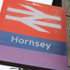 A photo of the sign at Hornsey Station in North London.